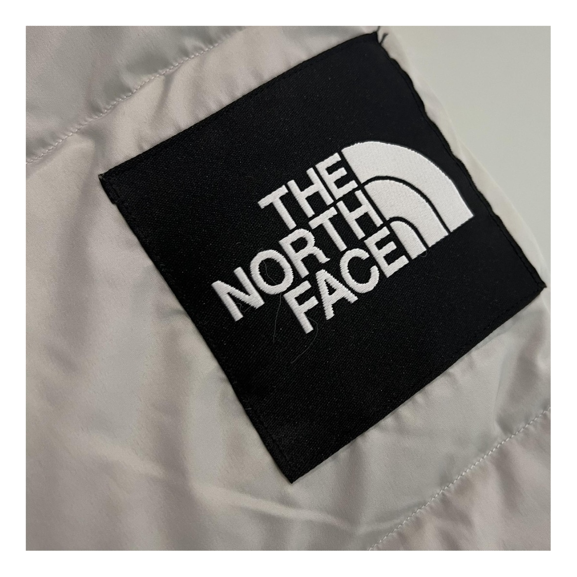 The North Face Color-Block Long Hooded Puffer Coat in Grey